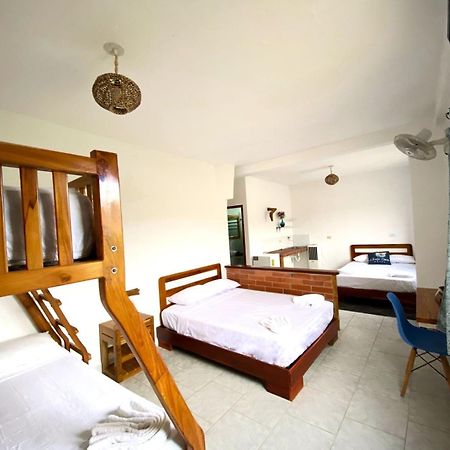 Whale House Hotel ปูแอร์โตโลเปซ ห้อง รูปภาพ