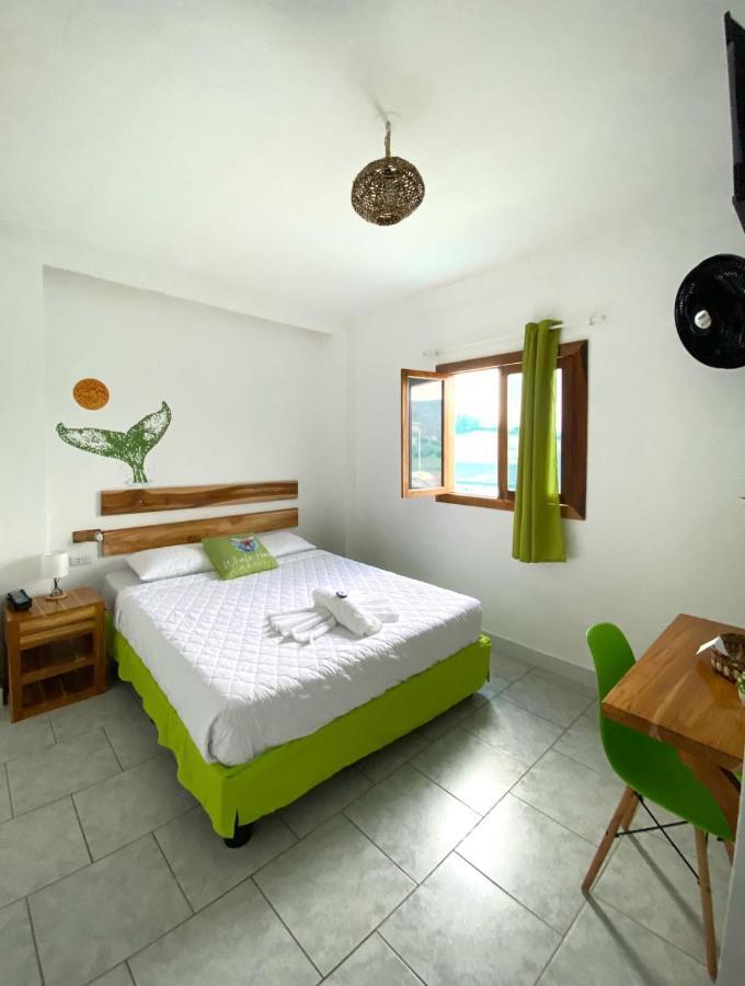 Whale House Hotel ปูแอร์โตโลเปซ ภายนอก รูปภาพ